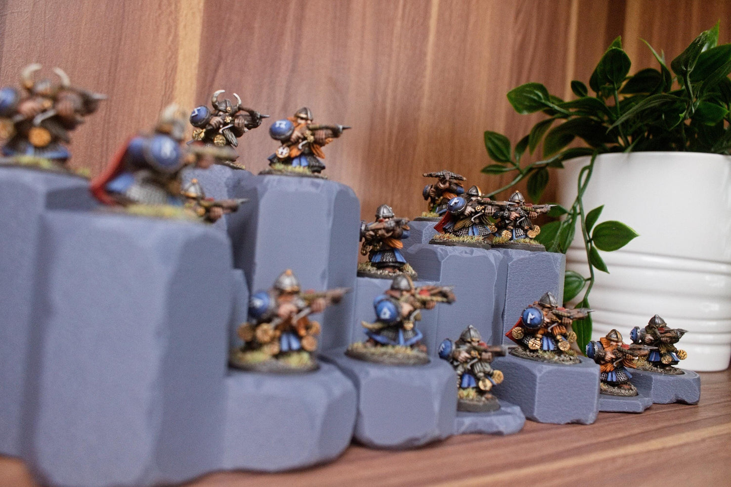 Set of 5 round slotted bases, perfect as terrain pieces or model displays. Features multifunctional designs with options for no holes. Bases rearrange into endless configurations with 3 unique shapes, ideal for tabletop gaming or mini displays.